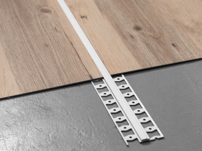 Dilatační profil ohebný pro podlahy Küberit 323G Stříbrná F4 do 12,5 mm